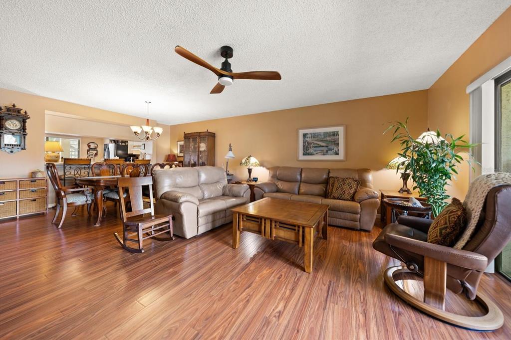 1801 East Lake Road South, Unit 10D Palm Harbor, FL 34685 - Photo 10 of 27 a living room with furniture