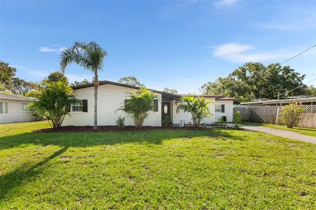 a house view with a garden space