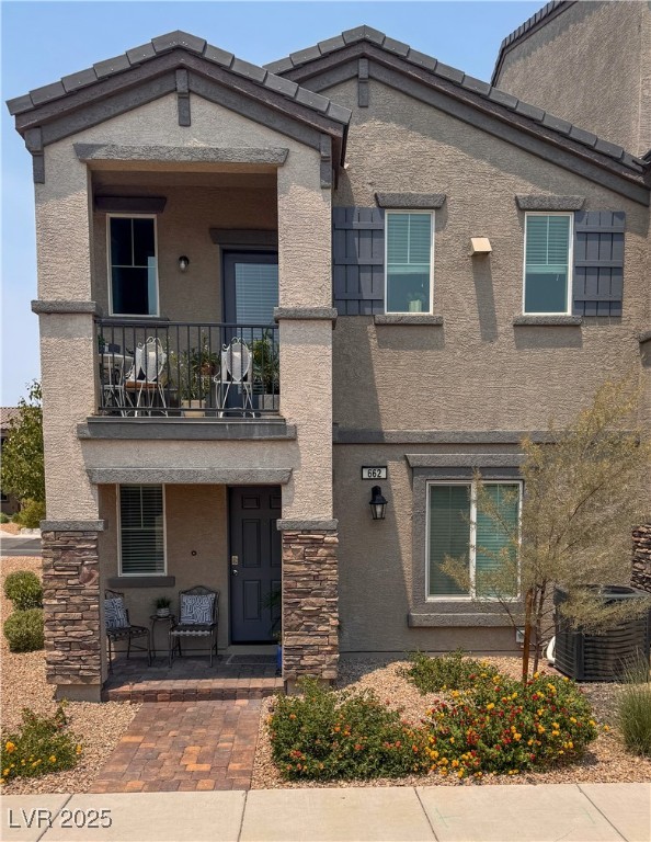 662 Foam Flower Lane Henderson, NV 89015 - Photo 1 of 14 View of front of house with a balcony, stucco sidi