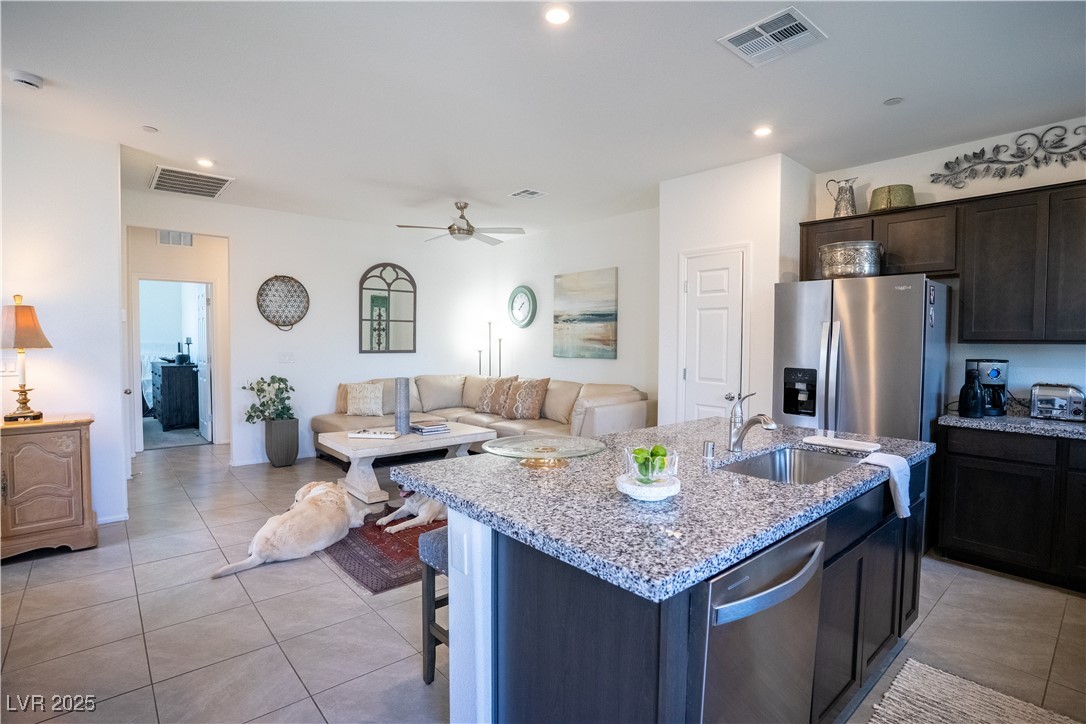 662 Foam Flower Lane Henderson, NV 89015 - Photo 9 of 14 Kitchen with appliances with stainless steel finis