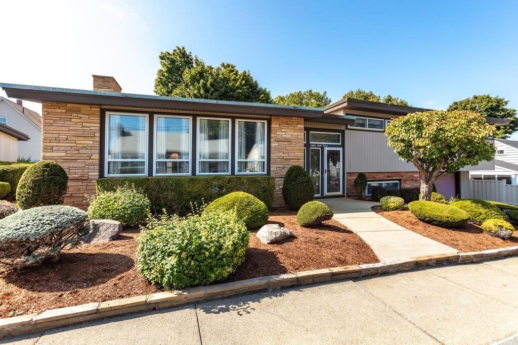 18 Amelia Avenue Winthrop, MA 02152 - Photo 2 of 34 a front view of a house with garden