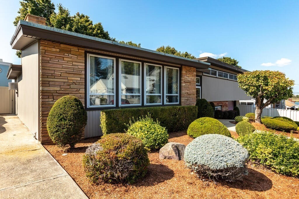 18 Amelia Avenue Winthrop, MA 02152 - Photo 4 of 34 a front view of a house with a yard