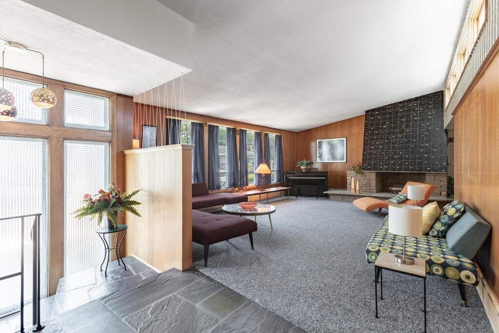 18 Amelia Avenue Winthrop, MA 02152 - Photo 5 of 34 a living room with furniture and a fireplace
