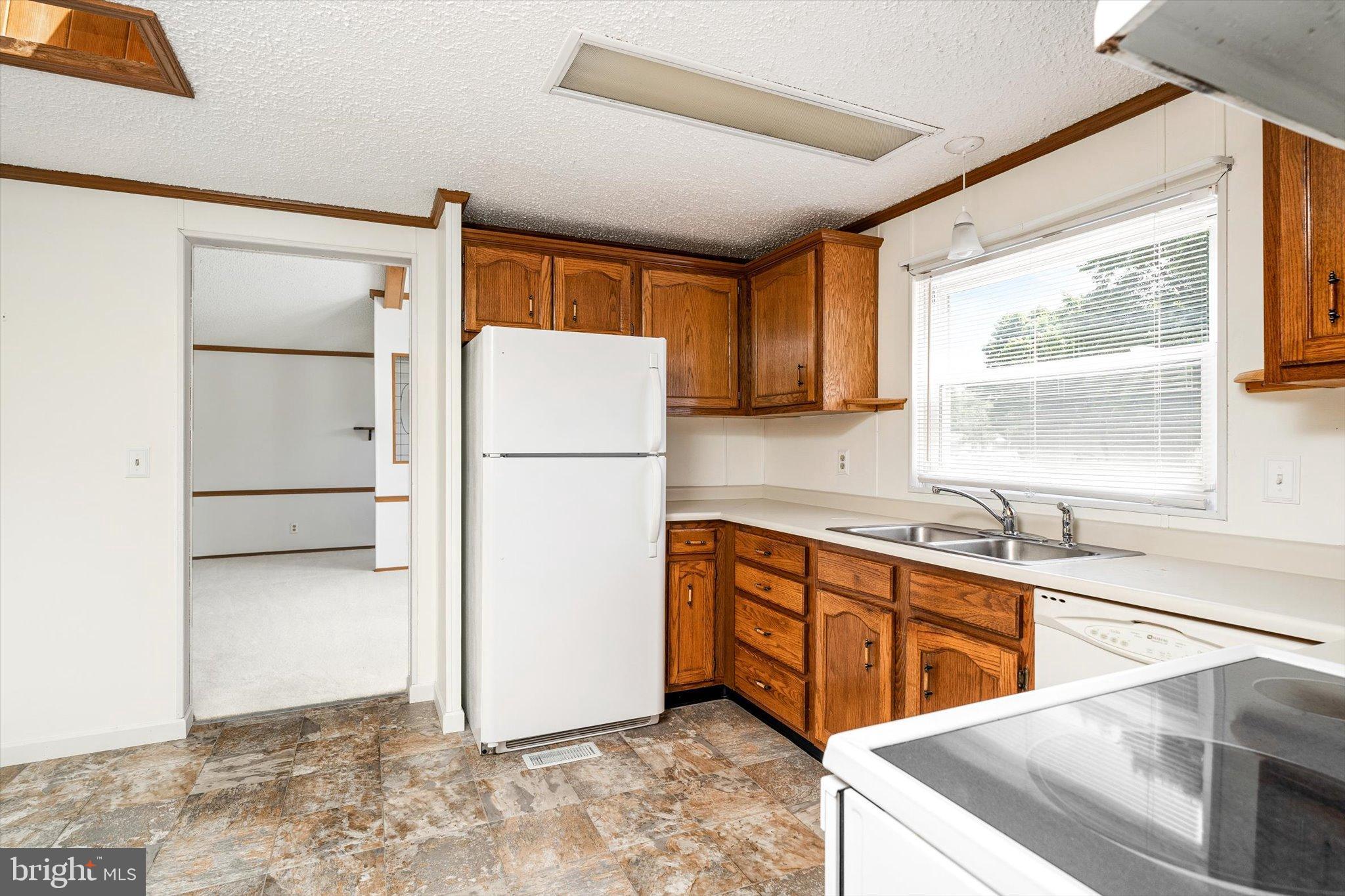3 Copperfield Drive Cream Ridge, NJ 08514 - Photo 11 of 27 a kitchen with stainless steel appliances granite countertop a refrigerator a sink and a stove