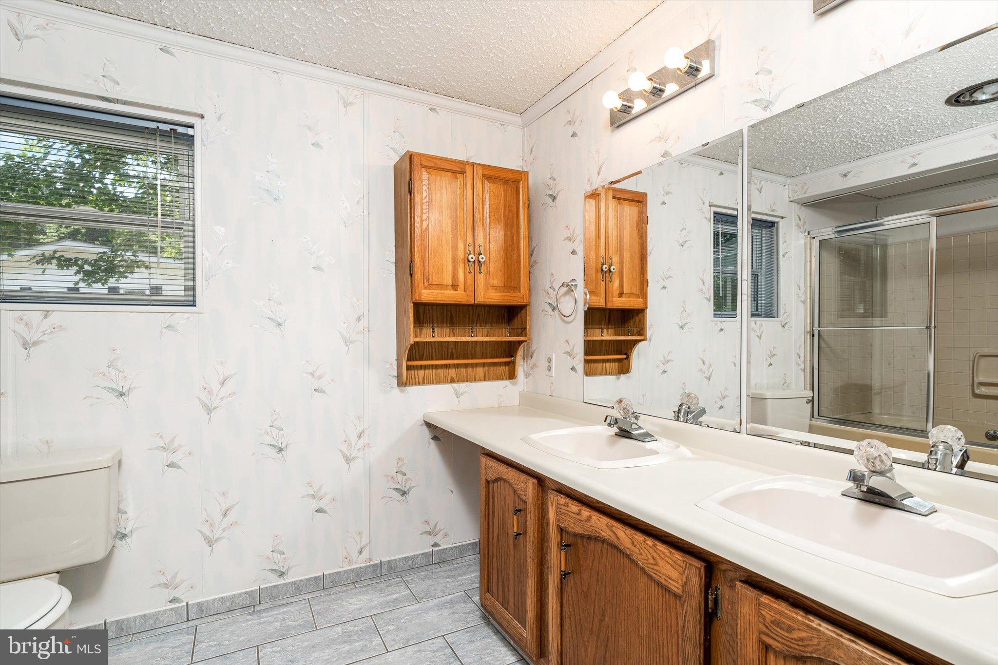 3 Copperfield Drive Cream Ridge, NJ 08514 - Photo 16 of 27 a bathroom with a sink a toilet and a mirror