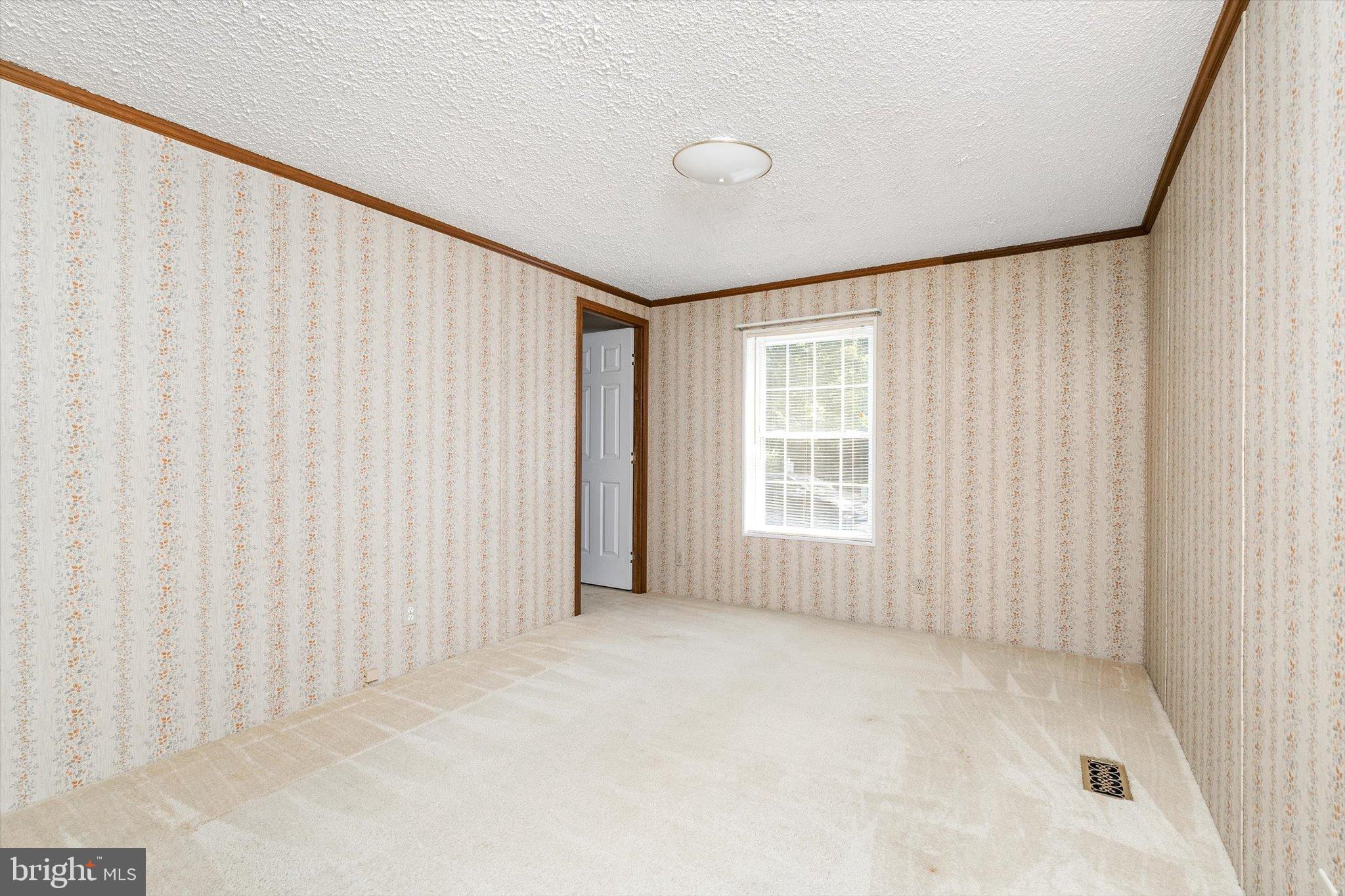 3 Copperfield Drive Cream Ridge, NJ 08514 - Photo 18 of 27 a view of an empty room with a window