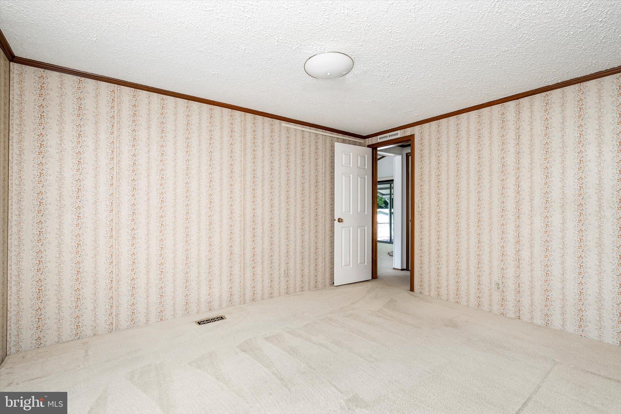 3 Copperfield Drive Cream Ridge, NJ 08514 - Photo 20 of 27 a view of an empty room with a window