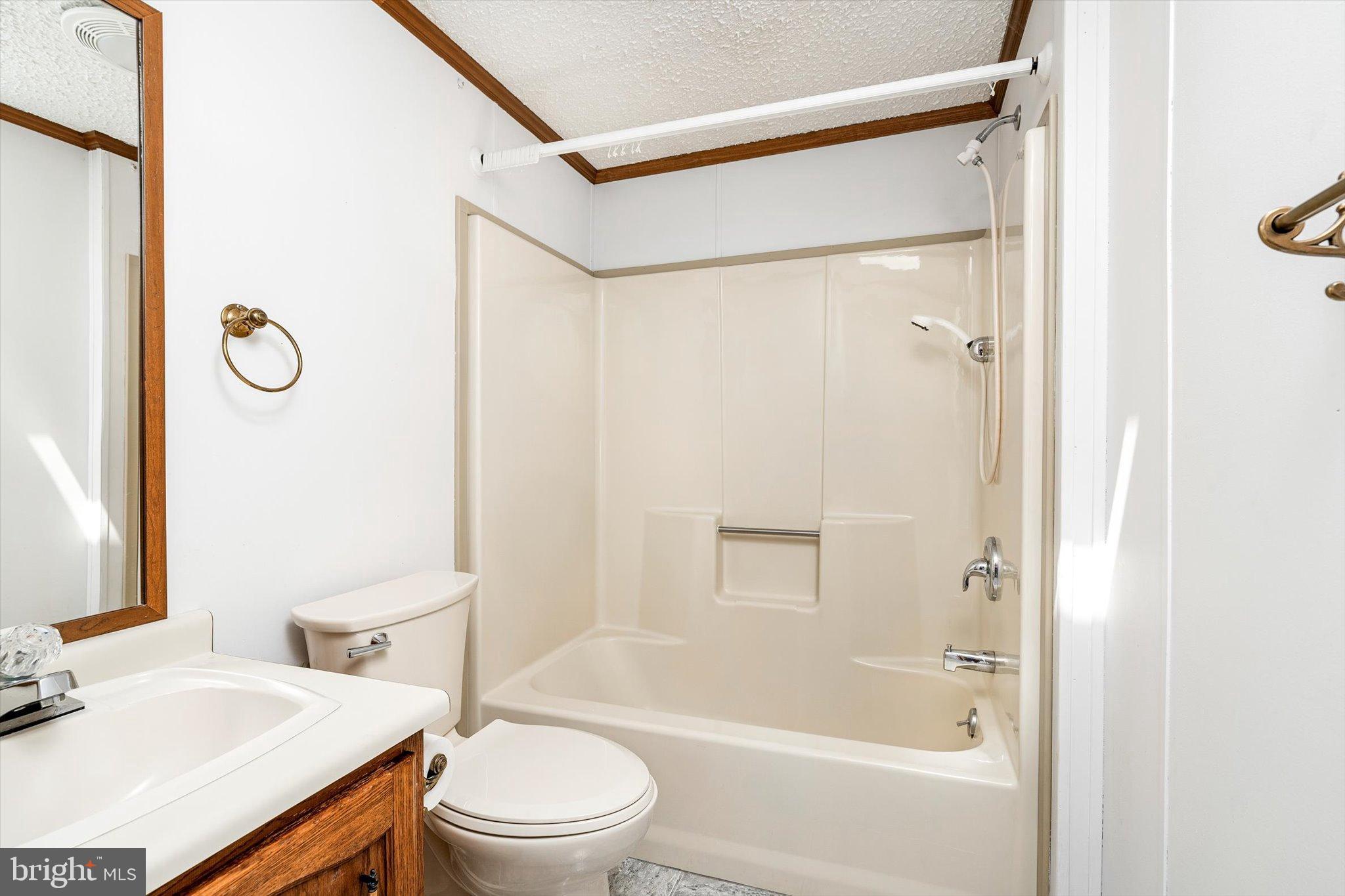 3 Copperfield Drive Cream Ridge, NJ 08514 - Photo 23 of 27 a bathroom with a sink and a mirror
