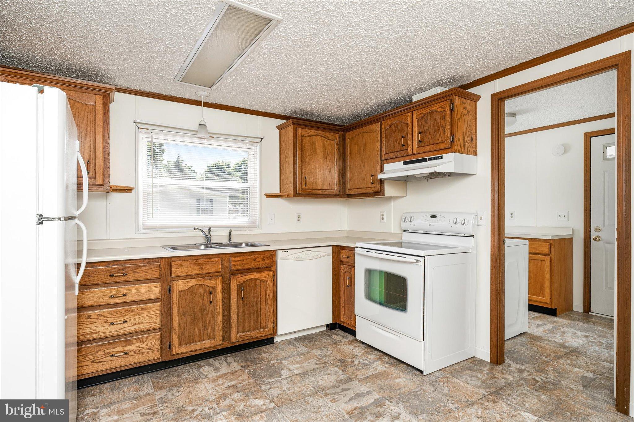 3 Copperfield Drive Cream Ridge, NJ 08514 - Photo 10 of 27 a kitchen with stainless steel appliances granite countertop a stove and a refrigerator