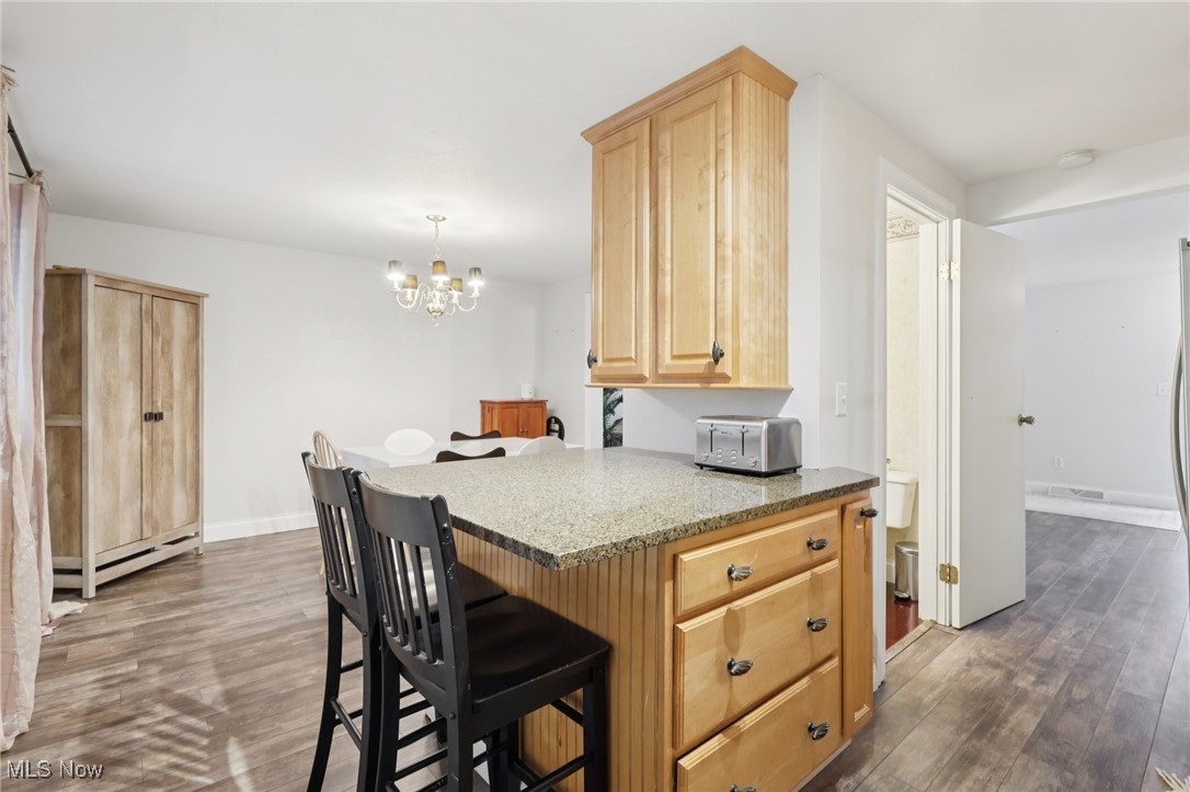 944 Hampton Ridge Drive Akron, OH 44313 - Photo 8 of 26 Kitchen Island. Open Between Kitchen and Dining Area.