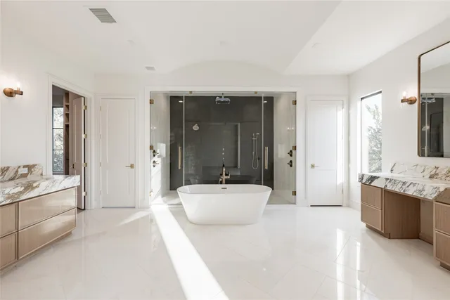 an empty room with a hardwood and a sink