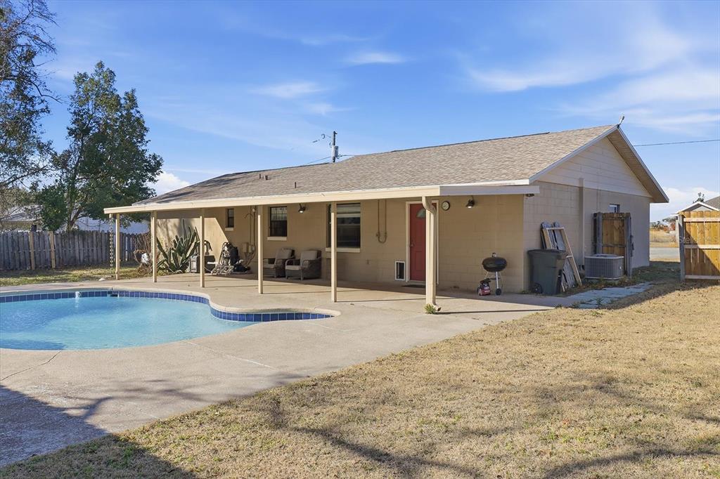 6940 Southeast 52nd Street Ocala, FL 34472 - Photo 3 of 45 a view of pool with outdoor seating