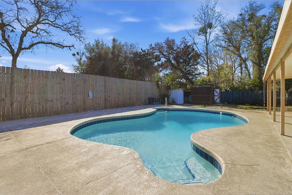 6940 Southeast 52nd Street Ocala, FL 34472 - Photo 35 of 45 a view of a swimming pool