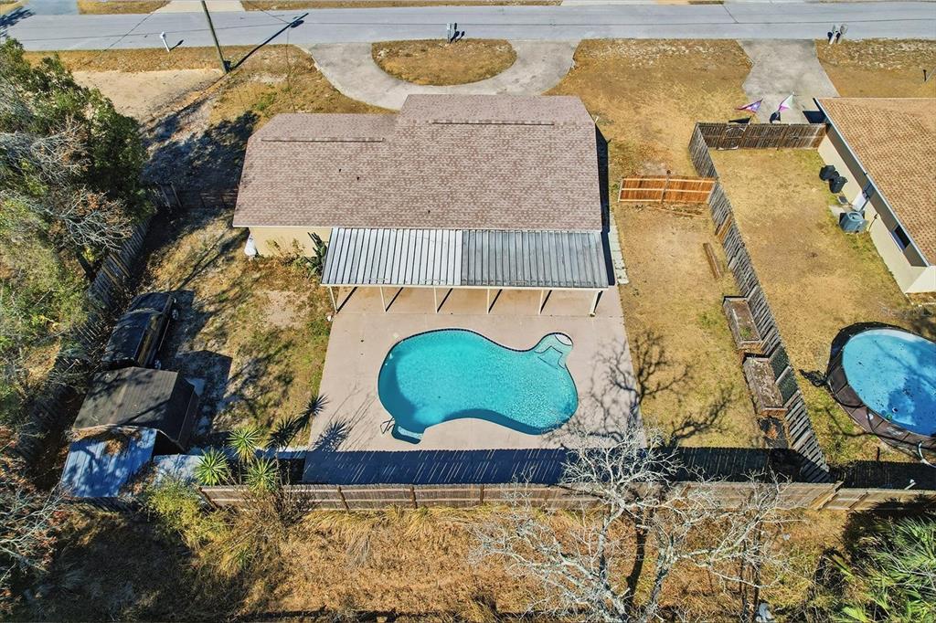 6940 Southeast 52nd Street Ocala, FL 34472 - Photo 40 of 45 a view of a wooden door