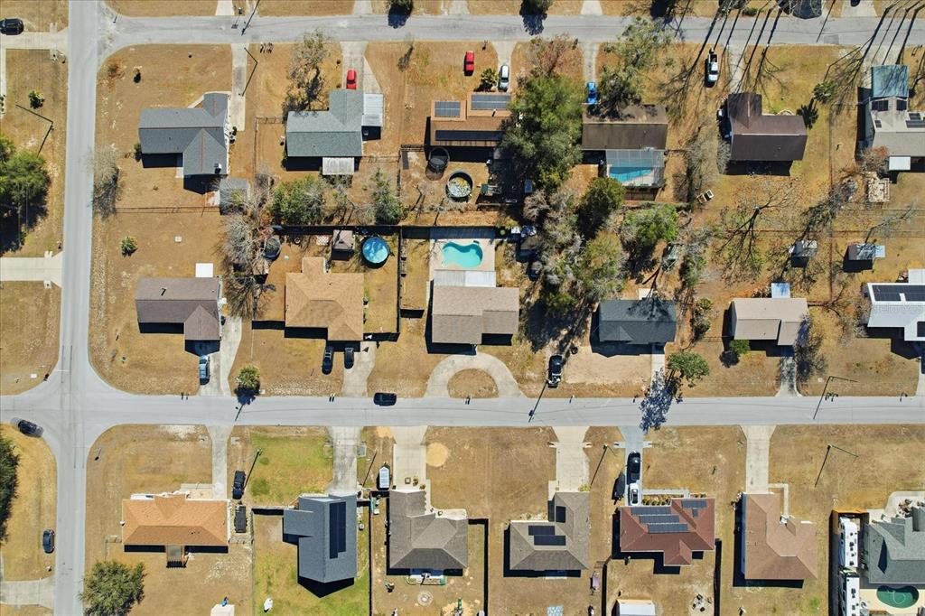 6940 Southeast 52nd Street Ocala, FL 34472 - Photo 42 of 45 an aerial view of residential houses with outdoor space