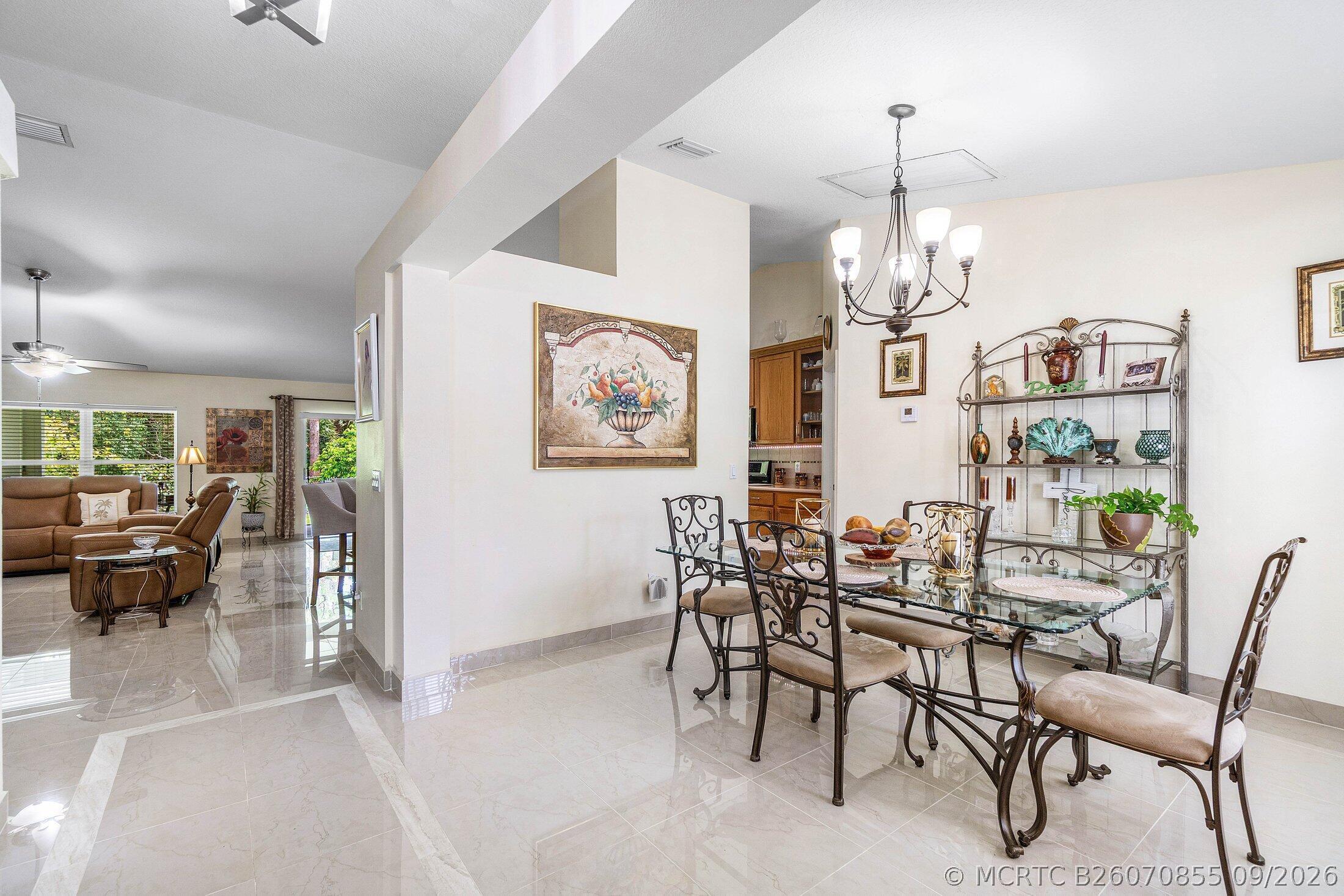 1629 Southwest Fortune Road Port St. Lucie, FL 34953 - Photo 8 of 33 Dining Room