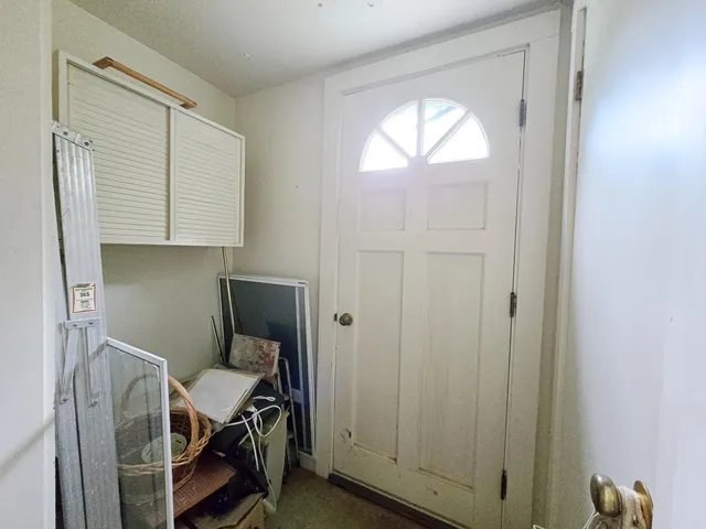 a view of workspace with wooden floor windows