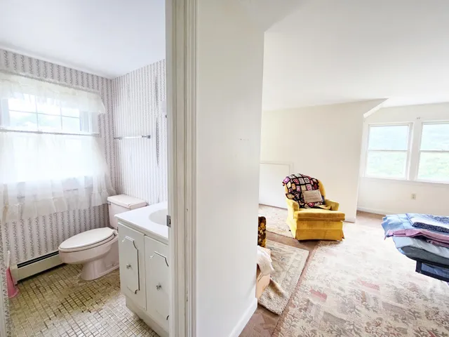 a bed room with a bed and a couch