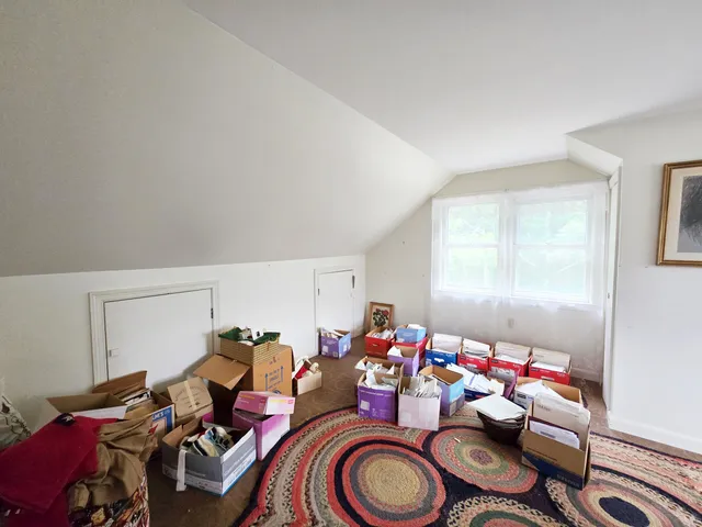 a room with gym equipment and a window