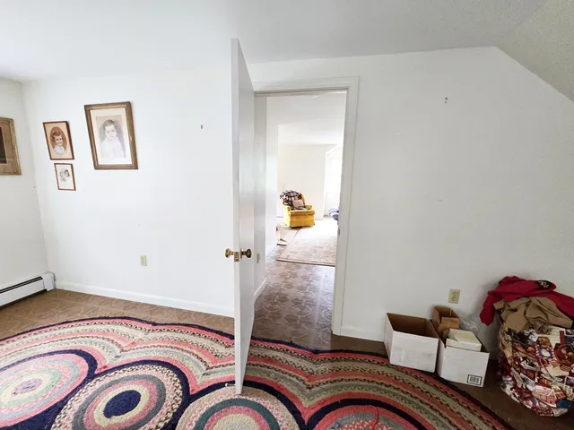 a view of a livingroom with furniture and a couch