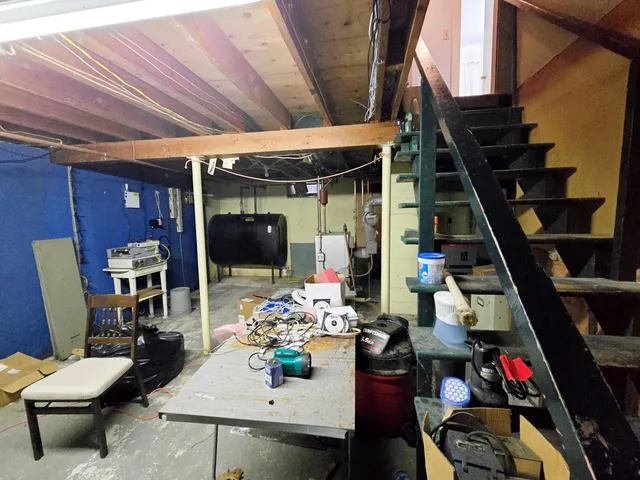 a room with furniture and a flat screen tv