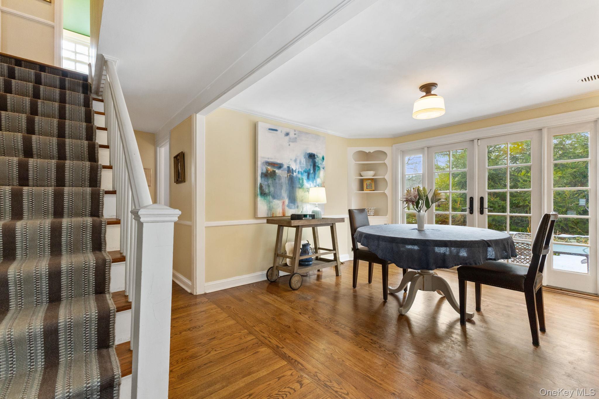 8 South Bedford Road Pound Ridge, NY 10576 - Photo 11 of 32 a view of a dining room with furniture and wooden floor
