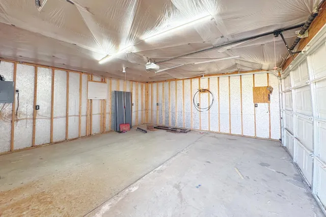 a view of an empty room with windows