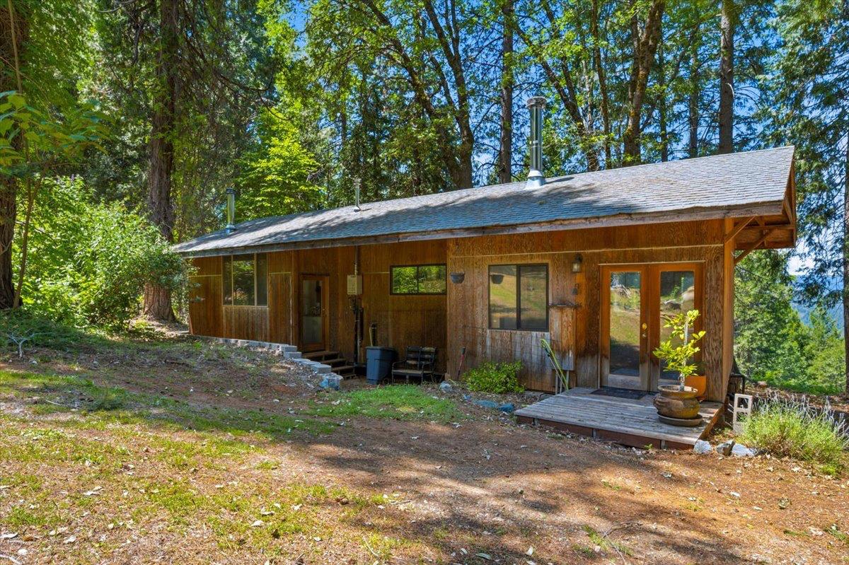 19643 Sages Road Nevada City, CA 95959 - Photo 2 of 39 a view of a house with a yard