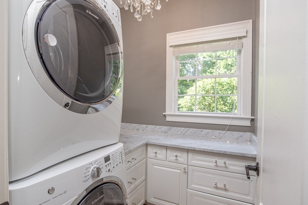 19 Round Farm Road Rehoboth, MA 02769 - Photo 18 of 42 a utility room with dryer and washer