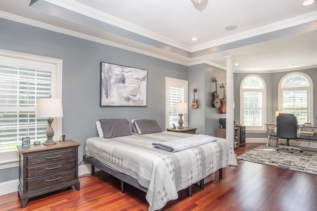 19 Round Farm Road Rehoboth, MA 02769 - Photo 20 of 42 a bedroom with a bed wooden floor and windows