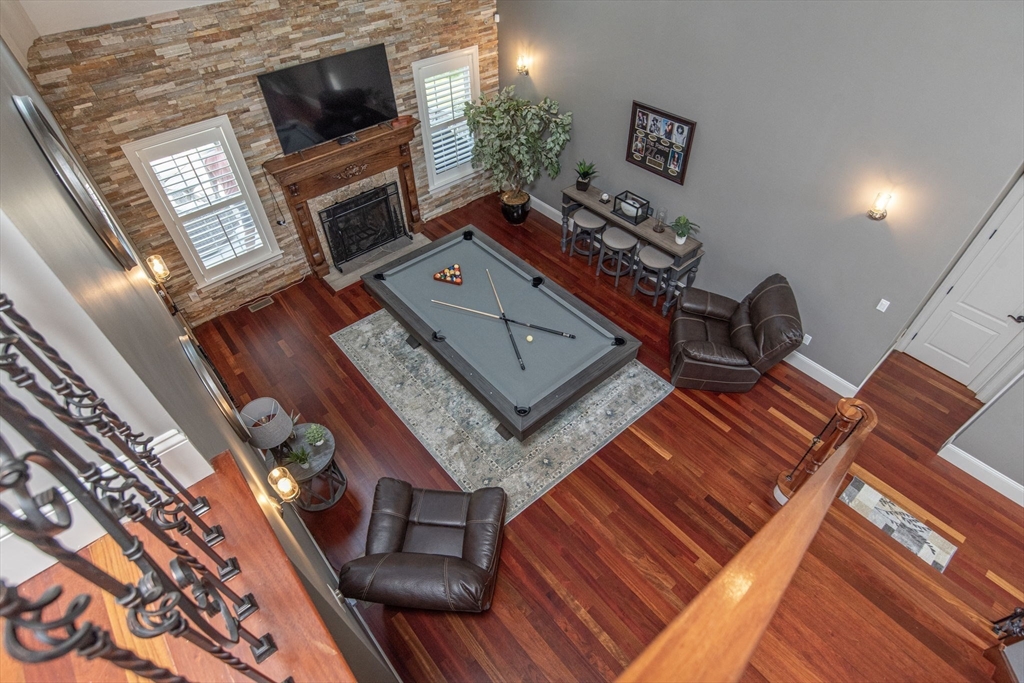 19 Round Farm Road Rehoboth, MA 02769 - Photo 28 of 42 a living room with furniture and a flat screen tv