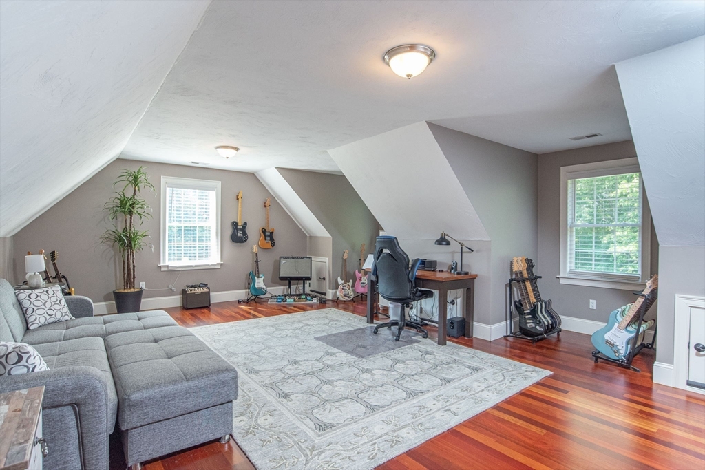 19 Round Farm Road Rehoboth, MA 02769 - Photo 30 of 42 a living room with furniture and a wooden floor