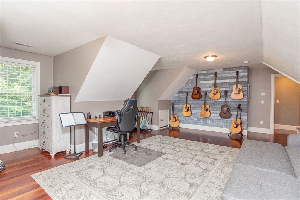 19 Round Farm Road Rehoboth, MA 02769 - Photo 31 of 42 a living room with furniture and a wooden floor