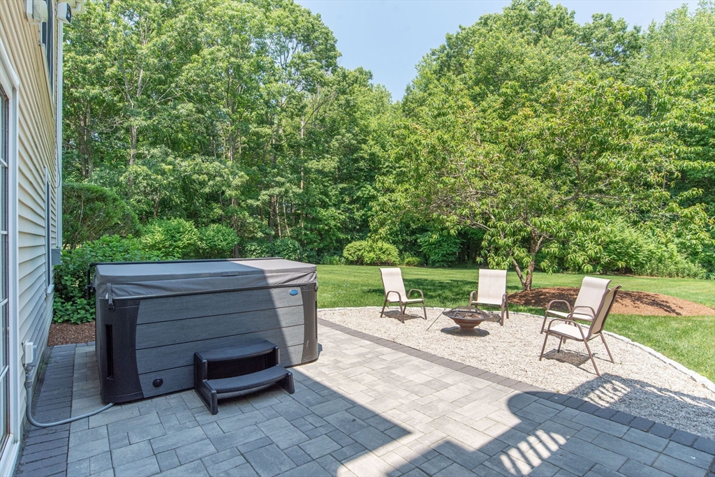 19 Round Farm Road Rehoboth, MA 02769 - Photo 36 of 42 a view of a chairs and tables in the backyard