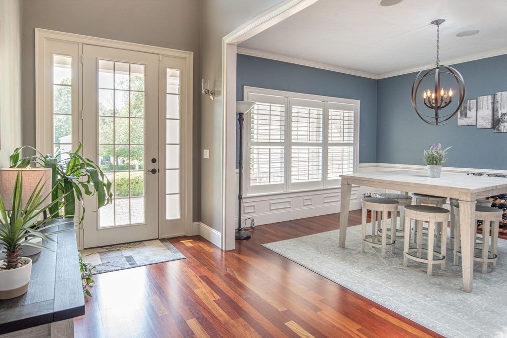 19 Round Farm Road Rehoboth, MA 02769 - Photo 5 of 42 a view of a dining room with furniture window and wooden floor