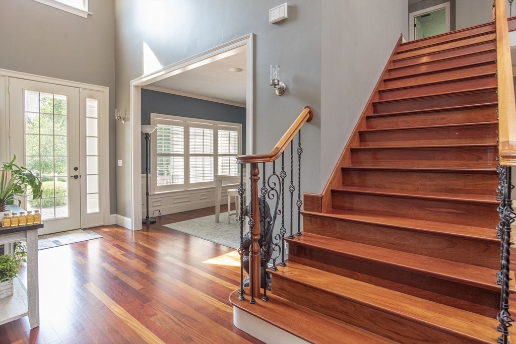 19 Round Farm Road Rehoboth, MA 02769 - Photo 8 of 42 a view of entryway and hall with wooden floor
