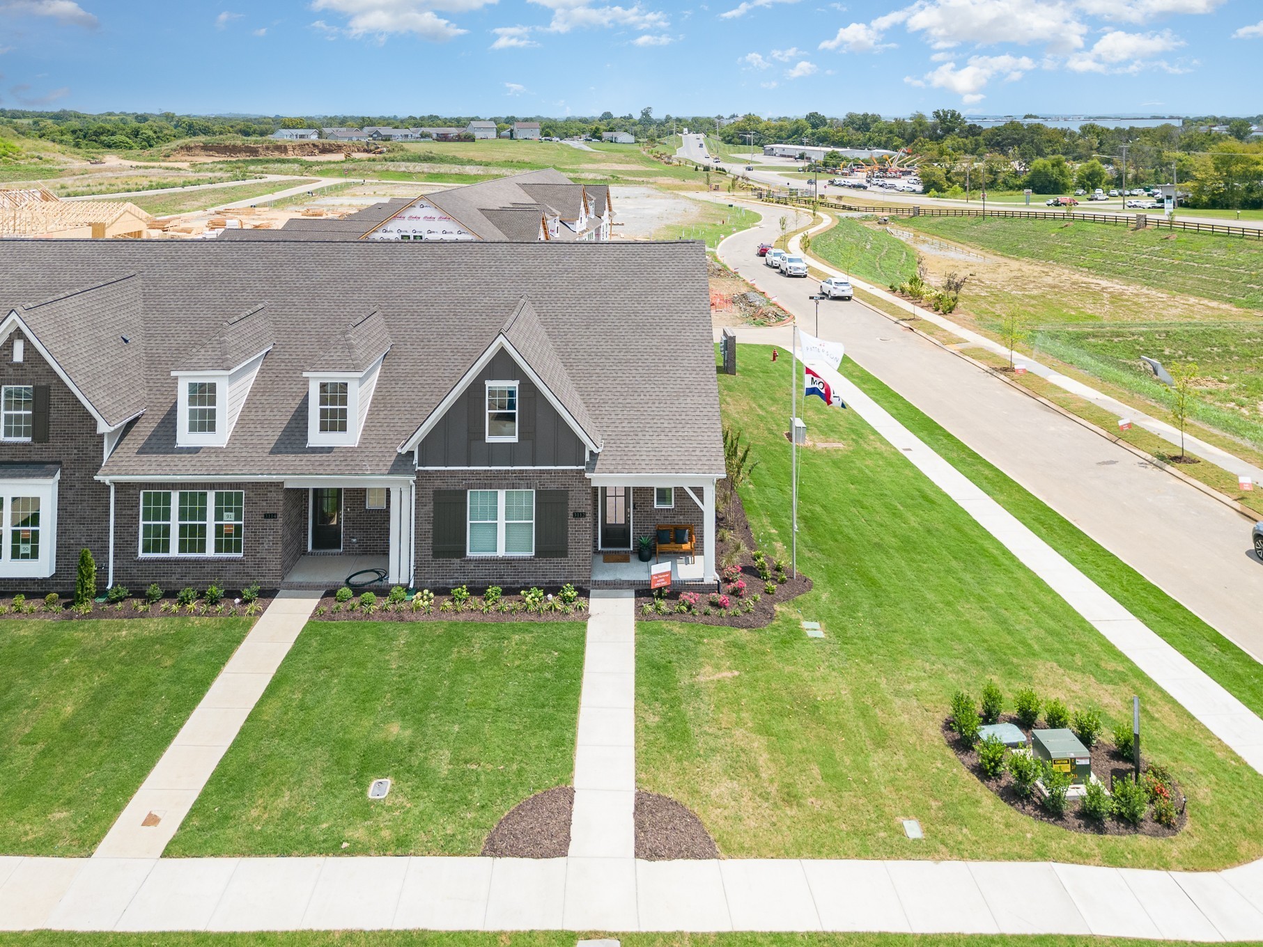 1079 Wrights Mill Road, Unit H8 Spring Hill, TN 37174 - Photo 4 of 64 a view of a house with a yard and a swimming pool