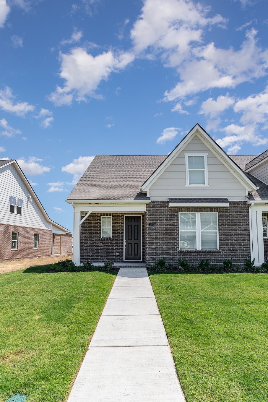1079 Wrights Mill Road, Unit H8 Spring Hill, TN 37174 - Photo 50 of 64 a front view of house with yard and green space