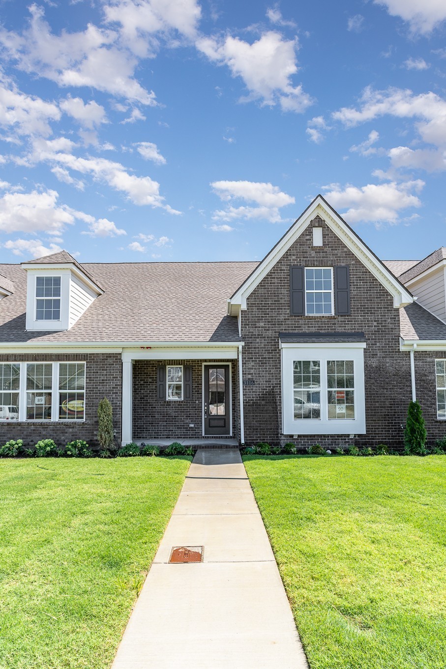 1079 Wrights Mill Road, Unit H8 Spring Hill, TN 37174 - Photo 53 of 64 a front view of house with yard and green space