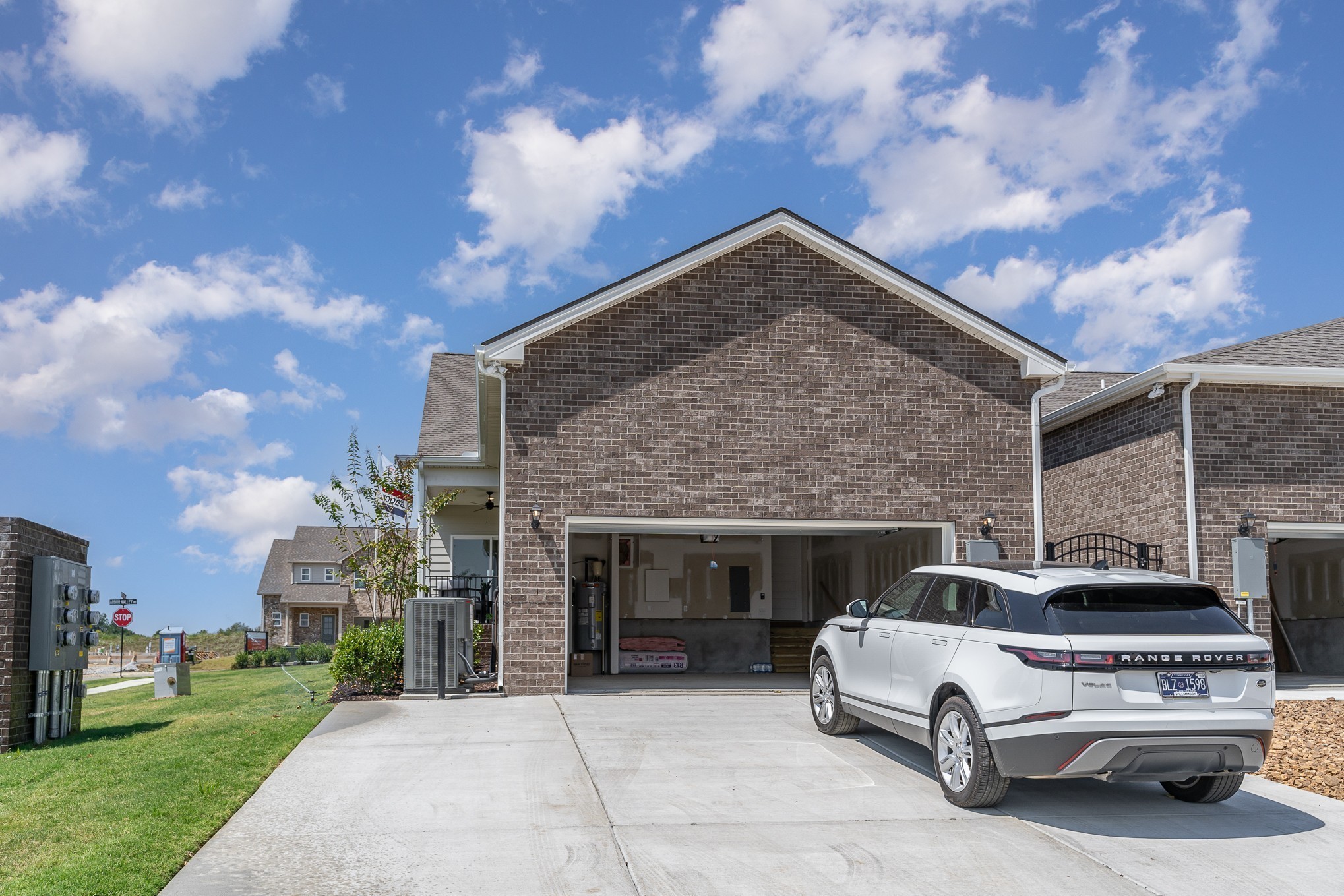 1079 Wrights Mill Road, Unit H8 Spring Hill, TN 37174 - Photo 62 of 64 a view of a car parked in front of a house