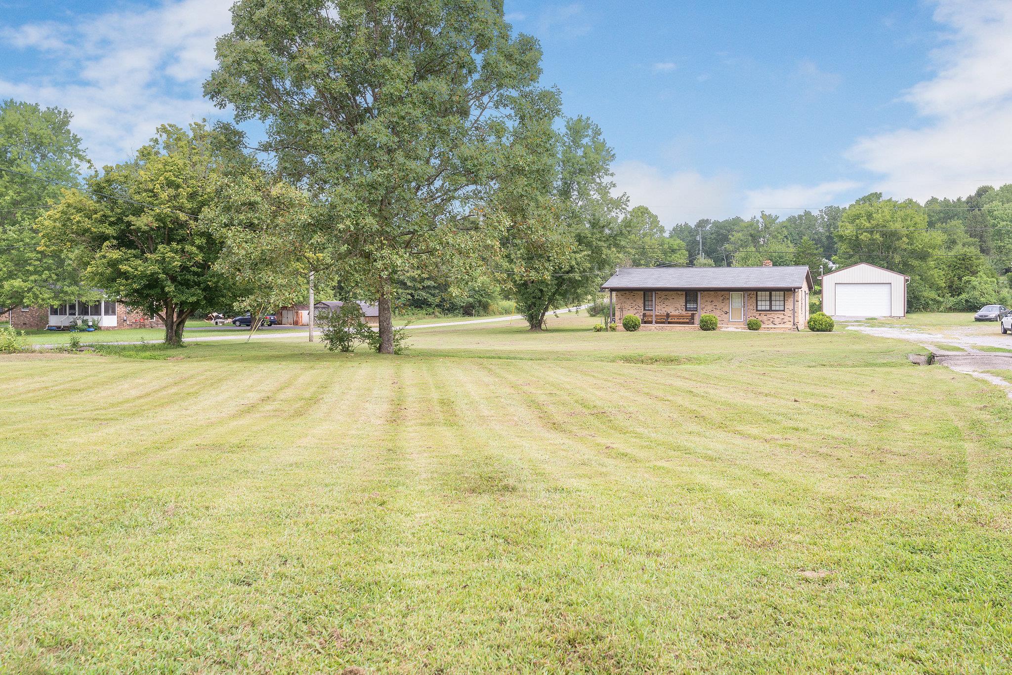 1011 Hamilton Chambers Road Lebanon, TN 37087 - Photo 14 of 14 a view of a swimming pool with an outdoor space and seating area