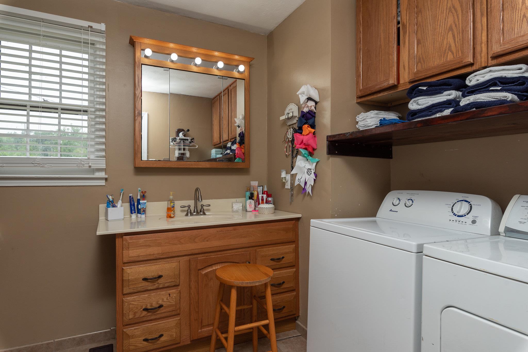 1011 Hamilton Chambers Road Lebanon, TN 37087 - Photo 10 of 14 a utility room with dryer and washer