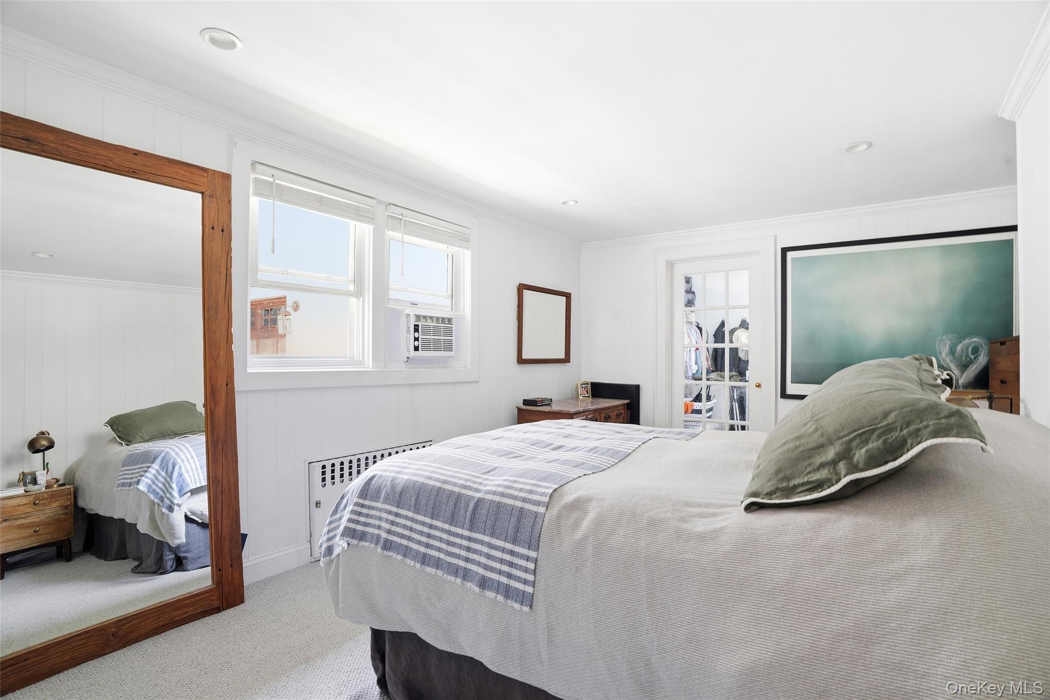 36 Dearborn Avenue Rye, NY 10580 - Photo 15 of 30 a bedroom with a bed and wooden floor