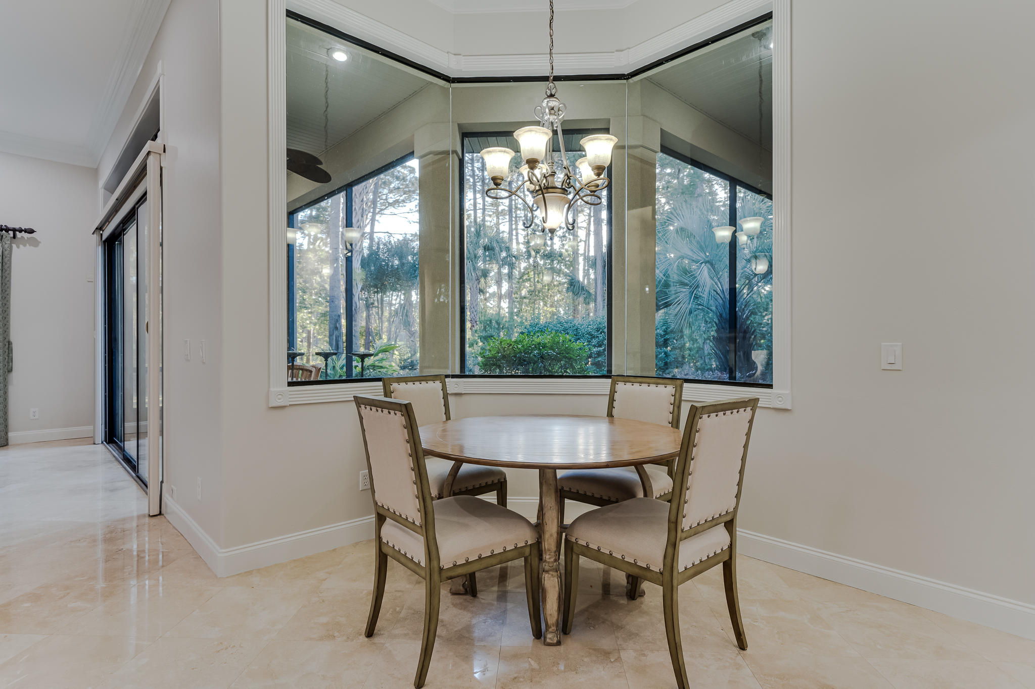 2922 Sand Pine Road Miramar Beach, FL 32550 - Photo 17 of 36 a dining room with furniture and window