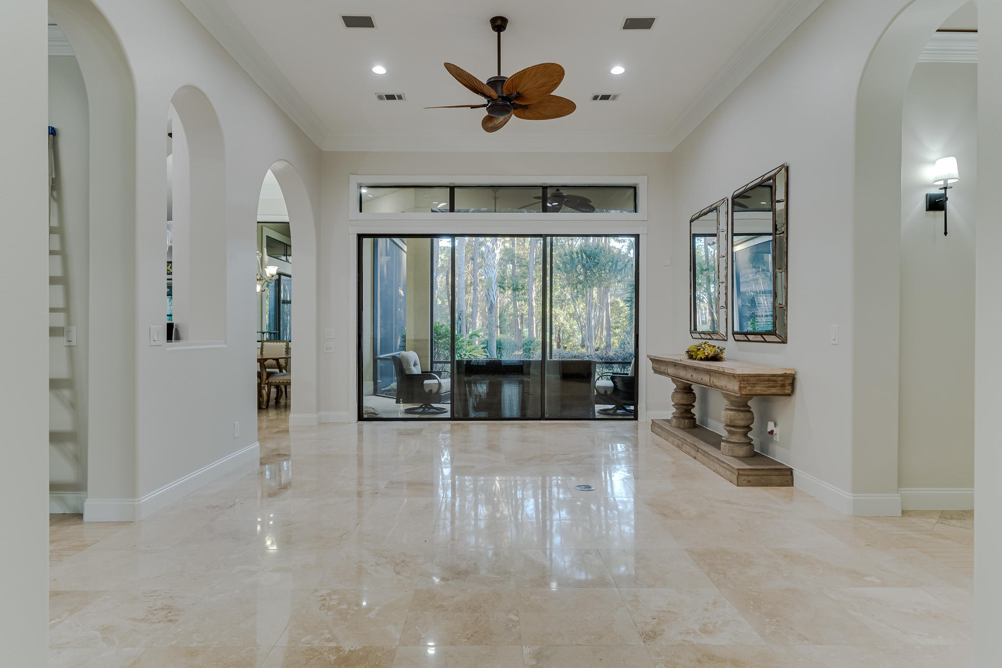 2922 Sand Pine Road Miramar Beach, FL 32550 - Photo 4 of 36 a living room with furniture and a large window