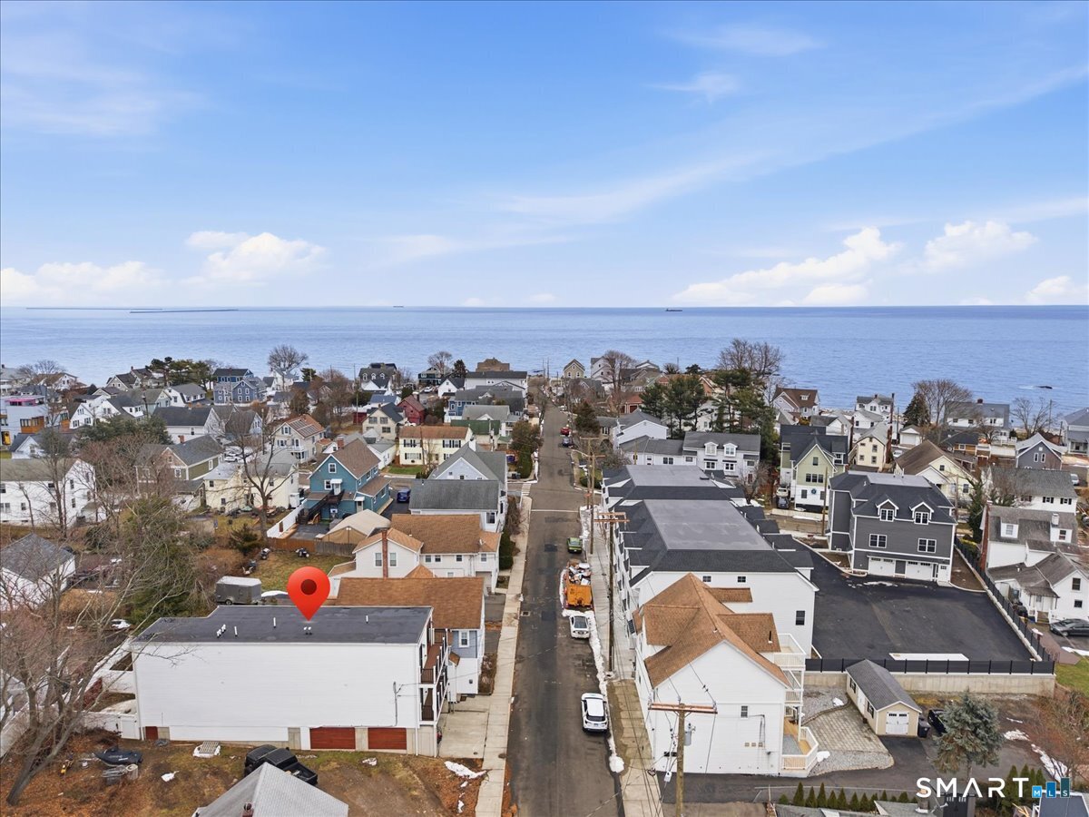 32 1/2 Village Road, Unit 1 Milford, CT 06460 - Photo 27 of 31 an aerial view of a city