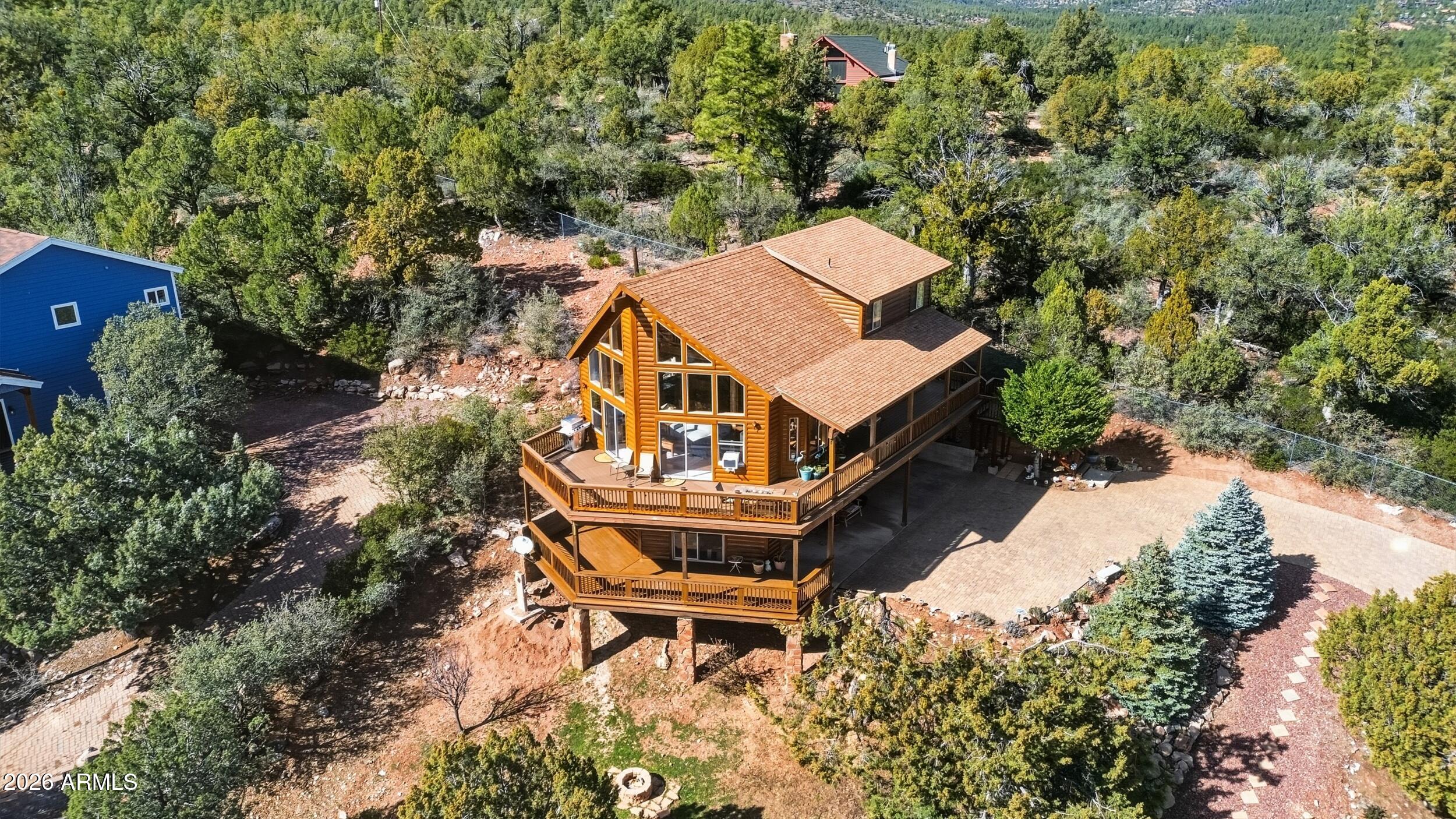 3119 Kysar Way Pine, AZ 85544 - Photo 45 of 68 an aerial view of a house with a yard