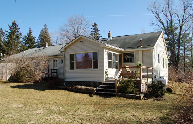 223 Main Road Monterey, MA 01245 - Photo 1 of 10 a view of a house with a yard