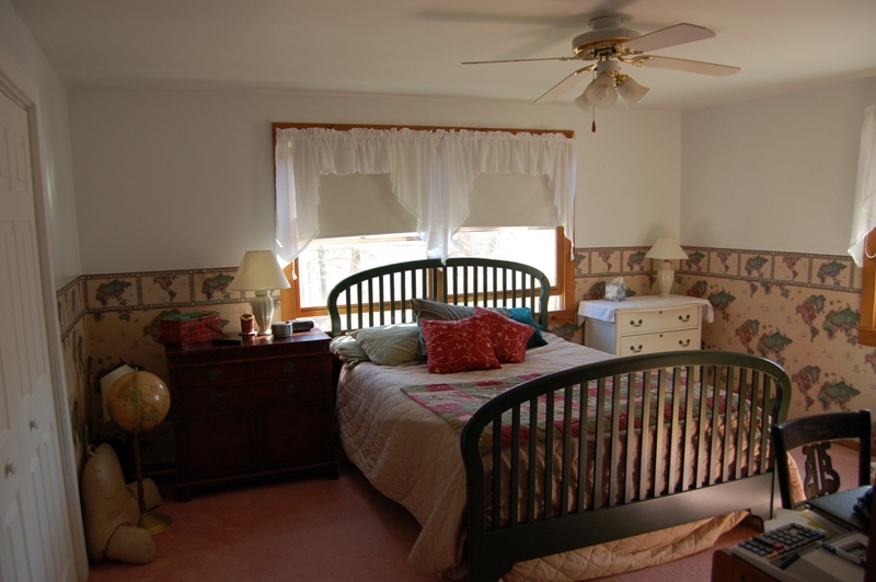 223 Main Road Monterey, MA 01245 - Photo 7 of 10 a bedroom with furniture and a window