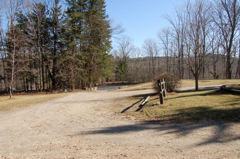 223 Main Road Monterey, MA 01245 - Photo 10 of 10 a backyard of a house with lots of green space